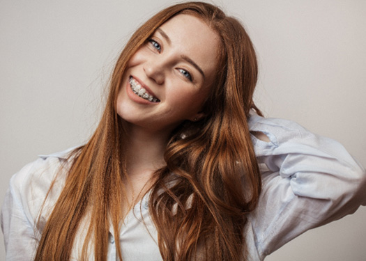 Holden patient showing ceramic braces close-up